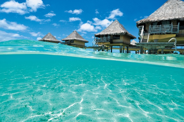 InterContinental Le Moana's unique bungalows are poised over the water and offer the ultimate island escape.